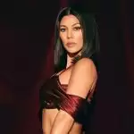 Kourtney Kardashian raises Temperature In Hot Bikinis.