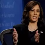 Trump administration ‘is admitting defeat’ on COVID-19, Kamala Harris in Michigan