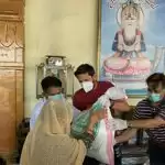 Afridi visits temple, distributes food to needy