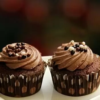 Try and enjoy chocolate cupcakes with buttercream frosting today; recipe inside!