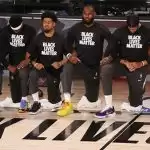 NBA players protest racial injustice as league returns to action