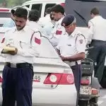 Changed traffic rule in UP, if you talk on mobile while driving, fine of Rs 10,000