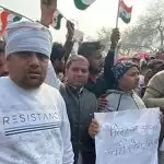 Shouting slogans against farmer movement on Singhu border