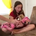 Seeing this sweet puppy with the cute girl will melt your heart