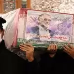 Iran buries slain nuclear scientist, promises retaliation