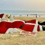 International Sand Artist Sudarshan Pattnaik Creates Sand Sculpture Of Santa Claus With 5,400 Roses