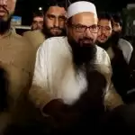 Pak court jails 2 more aides of JuD chief Hafiz Saeed in terror financing case