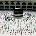 Pilgrims return to Mecca as Saudi Arabia eases COVID restrictions