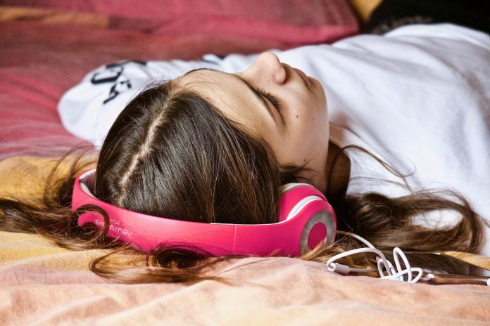 woman sleeping on bed