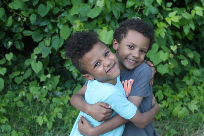 brothers hugging each other
