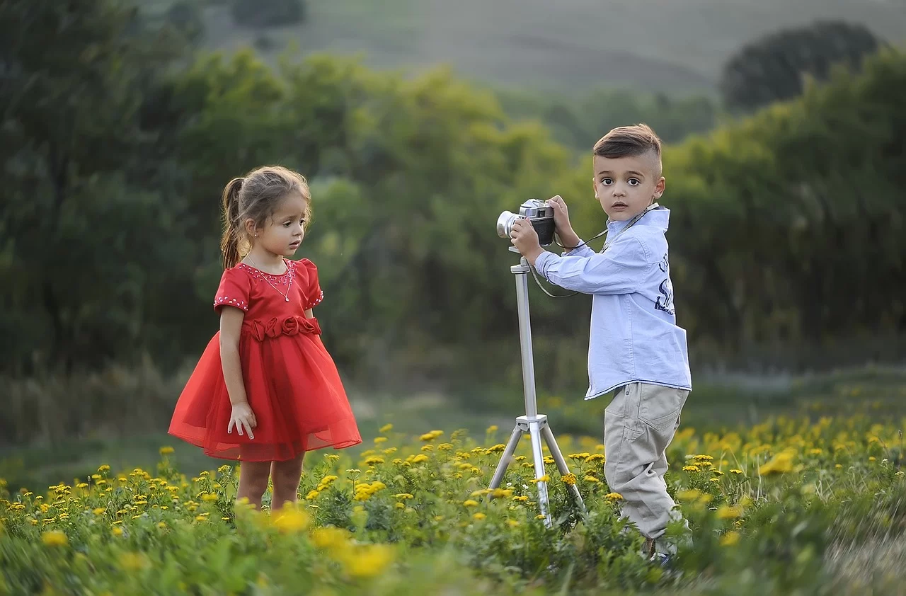 children taking photograph