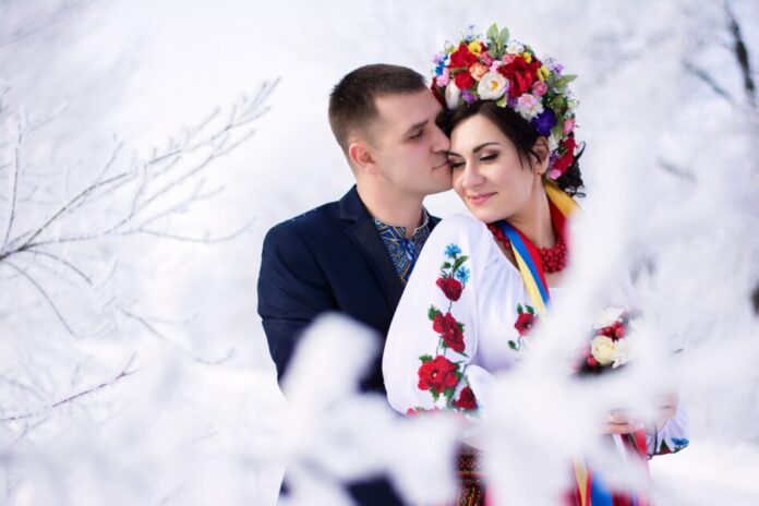 couple kissing in winter