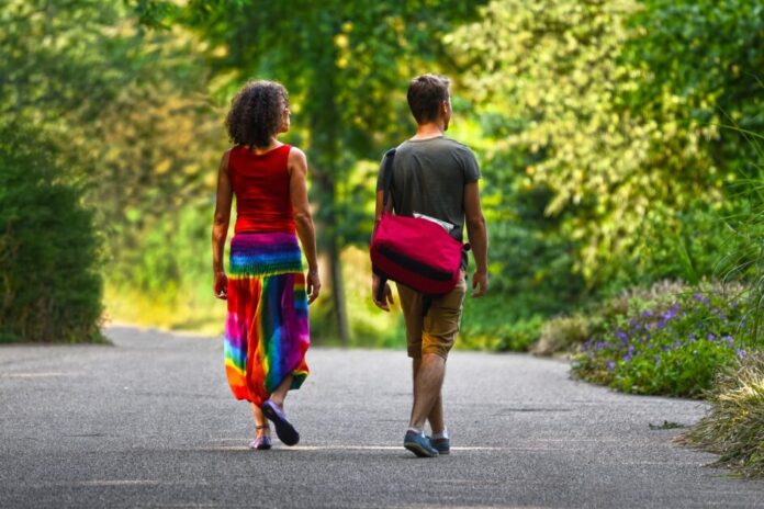 man and woman walking