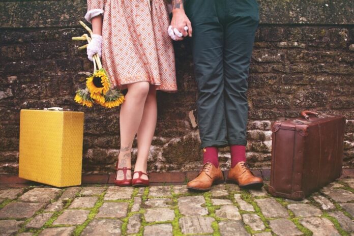 woman and man with bags