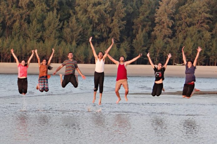 youngsters happy in a beach