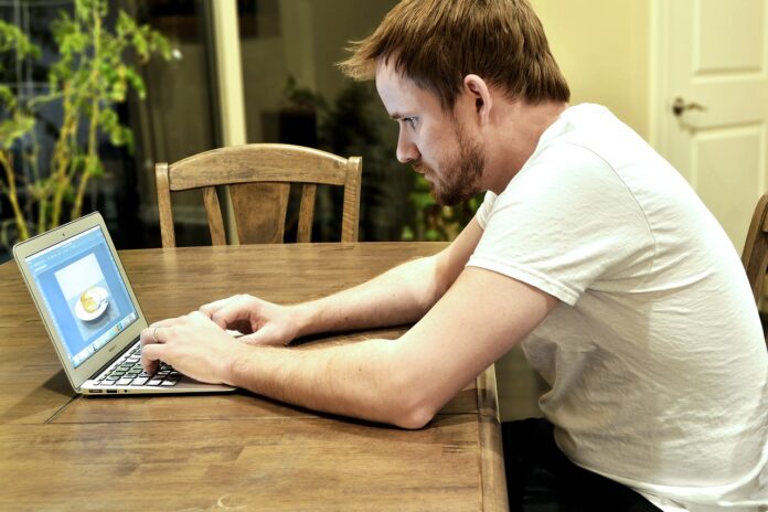 man with laptop