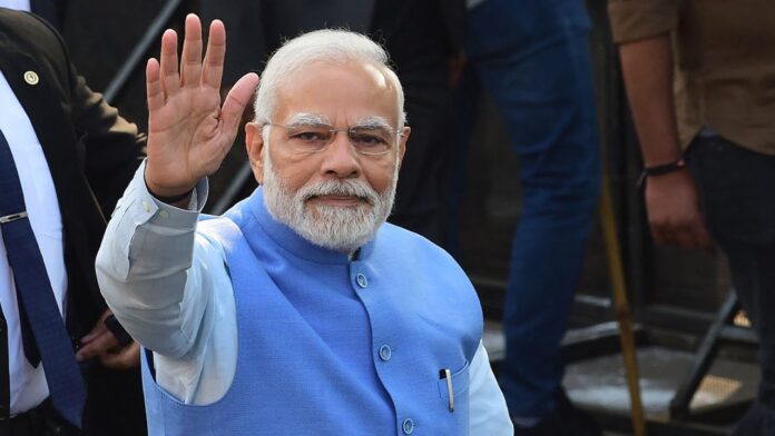 modi waving hands