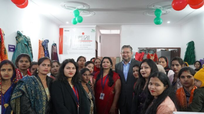 Launch event of Amway India's Pehal initiative aimed at empowering women economically, featuring key speakers and participants.